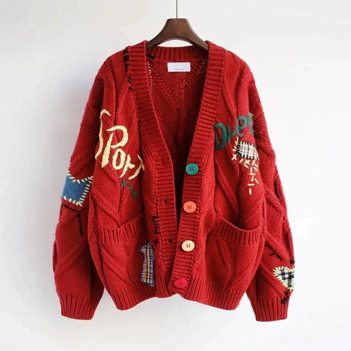 Damski sweter z golfem i haftem patchwork