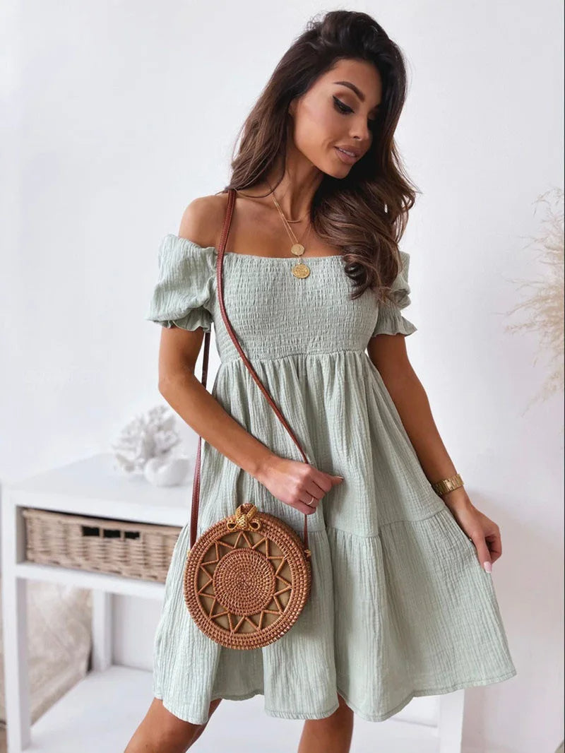 Elegancka letnia sukienka mini na jedno ramię