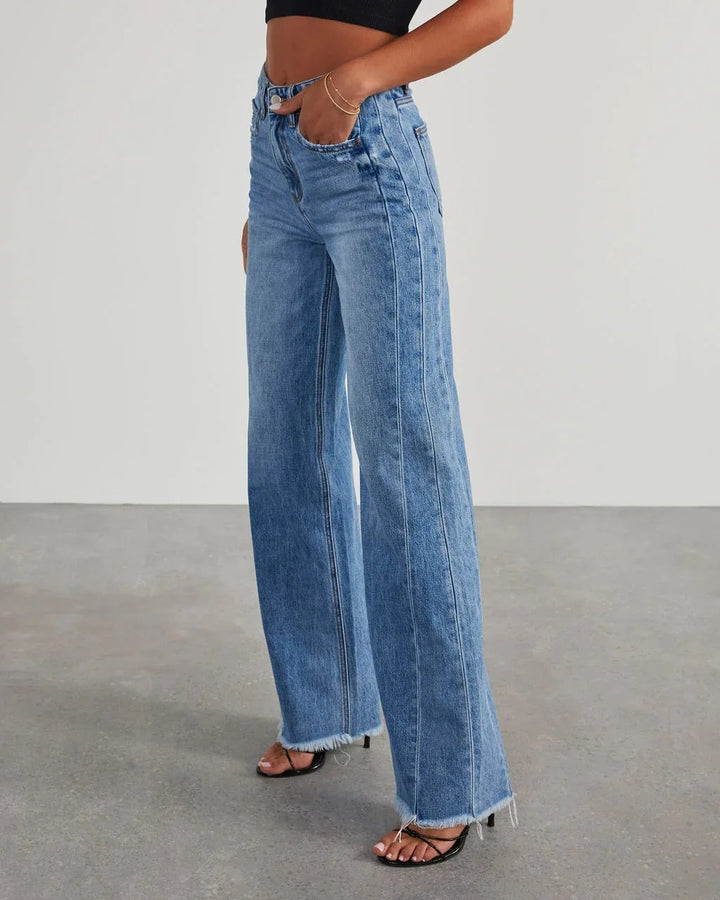 Damskie jeansy dzwony z postrzępionym brzegiem