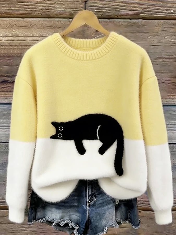 Sweter oversize z nadrukiem kota