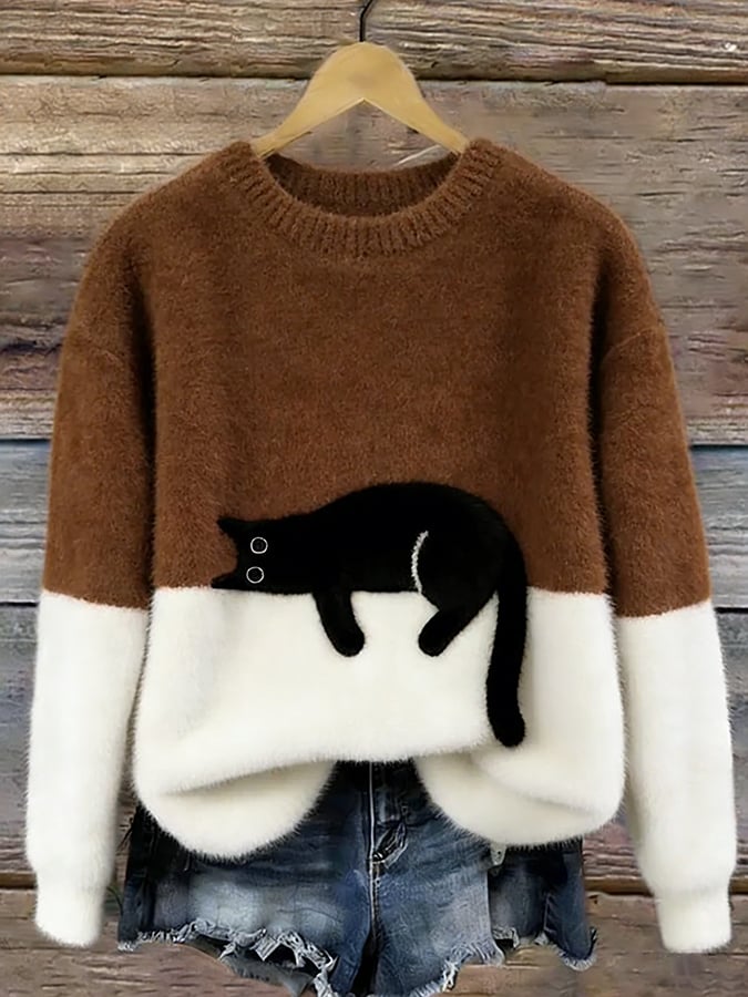Oversize'owy sweter z nadrukiem kota
