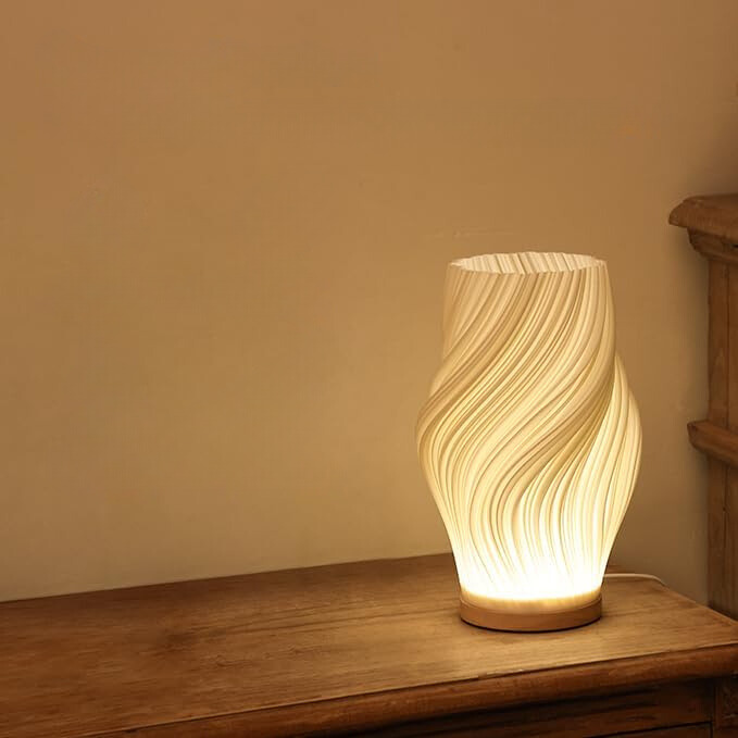 Luksusowa lampka stołowa LED z wirującym wzorem