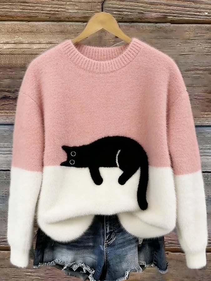Oversize'owy sweter z nadrukiem kota